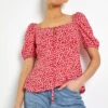Red Ditsy Floral Tie Neck Peplum Top 1 Red Ditsy Floral Tie Neck Peplum Top -Outlet Modi Qube Store 1691a7d1 ebb4 40e9 b1b0 d0e3bb2f8352