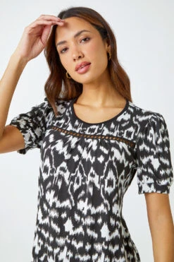 Black Aztec Print Puff Sleeve Top