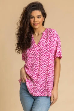 Cerise Spot Print V-Neck Tunic Top -Outlet Modi Qube Store 2b9f6553 2950 4847 a9b1 fa05a8a5faf0