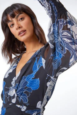 Blue Floral Print Chiffon Wrap Midi Dress 11 Blue Floral Print Chiffon Wrap Midi Dress -Outlet Modi Qube Store 2dbf9a96 6f60 4b18 9457 7a9a7ce777a9