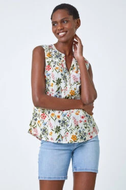 Ivory Ditsy Floral Print Sleeveless Blouse