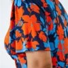 Orange Curve Floral Frill Sleeve Top