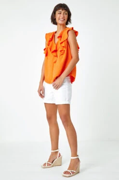 Orange Sleeveless Ruffle Detail Vest 10 Orange Sleeveless Ruffle Detail Vest -Outlet Modi Qube Store 3b4e2ff5 57a3 4376 83ce eac02f48b094