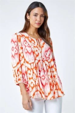 Orange Spot Print Hanky Hem Tunic Top