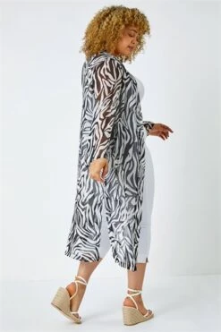 Black Curve Animal Shirred Stretch Maxi Dress -Outlet Modi Qube Store 694868f7 e2cc 4cf0 ba44 d1b696986a96