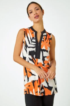 Orange Sleeveless Leaf Print Zip Top -Outlet Modi Qube Store a99374ca c95d 40e6 9d4b 0f2d6c91c6b2