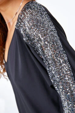 Black Sequin Trim Stretch Jersey Top 11 Black Sequin Trim Stretch Jersey Top -Outlet Modi Qube Store b1028c88 1b82 44fa b86c 15f9d0cd61fd