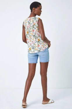 Ivory Ditsy Floral Print Sleeveless Blouse 9 Ivory Ditsy Floral Print Sleeveless Blouse -Outlet Modi Qube Store b2616ea8 6ab3 4826 89eb 95c42e758056