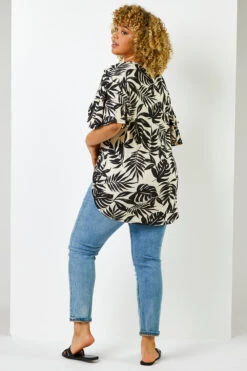 Black Curve Tropical Leaf Print Frill Sleeve Top -Outlet Modi Qube Store ba886714 0ffb 480c a872 57ba6d5b7e55