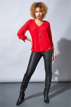 Orange Chiffon Jersey Blouson Top With Necklace