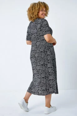 Black Curve Floral Print Midi Dress -Outlet Modi Qube Store ed6a6a51 e9d6 4f43 a86c 684a16dc820a